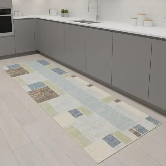 8' Blue Brown And Tan Geometric Washable Runner Rug Photo 1