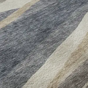 Photo of 8' Blue Brown And Taupe Abstract Washable Round Rug With UV Protection