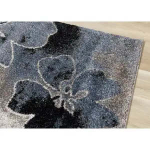 Photo of 8' Blue Cream And Black Botanical Leaves Runner Rug