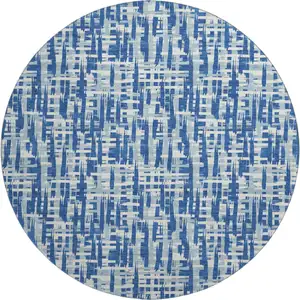 Photo of 8' Blue Denim Blue And Ivory Abstract Geometric Washable Round Rug With UV Protection
