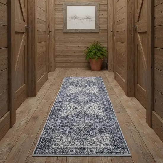 12' Blue Floral Distressed Runner Rug Photo 1