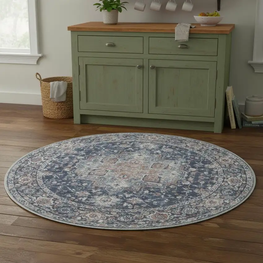 4' Blue Floral Power Loom Worn Faded Round Rug Photo 1