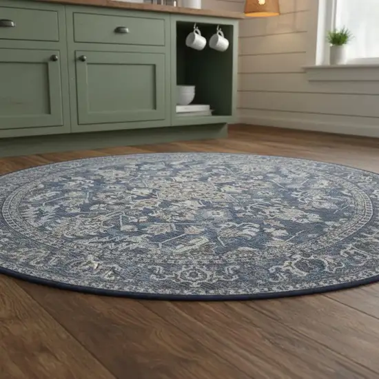 5' Blue Floral Power Loom Worn Faded Round Rug Photo 1