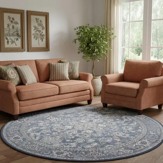 8' Blue Floral Power Loom Worn Faded Round Rug Photo 1