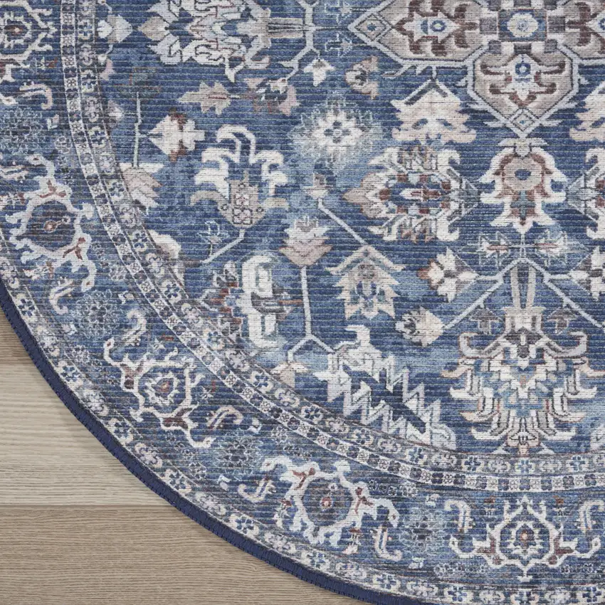 8' Blue Floral Power Loom Worn Faded Round Rug Photo 9