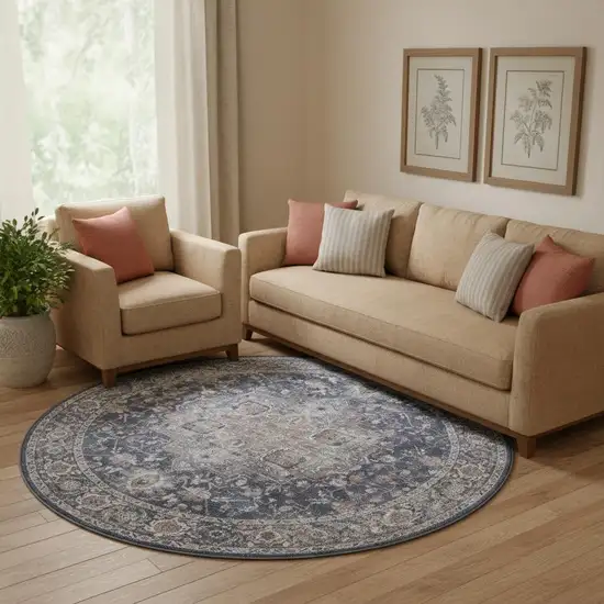 8' Blue Floral Power Loom Worn Faded Round Rug Photo 1