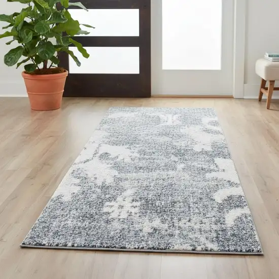 6' Blue Floral Power Loom Worn Faded Runner Rug Photo 1