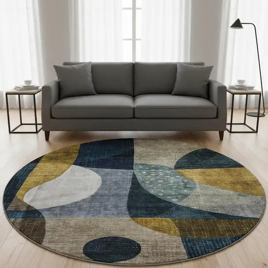 8' Blue Gold And Beige Abstract Geometric Washable Round Rug With UV Protection Photo 2