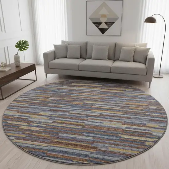 8' Blue Gold And Brown Abstract Washable Round Rug With UV Protection Photo 1