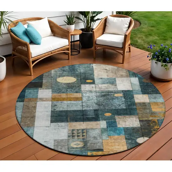 8' Blue Gold And Gray Round Abstract Washable Indoor Outdoor Area Rug Photo 1