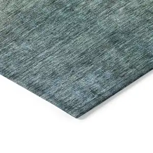 Photo of 8' Blue Gold And Green Round Abstract Washable Indoor Outdoor Area Rug