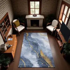 Photo of 8' Blue Gold And Ivory Abstract Washable Area Rug With UV Protection