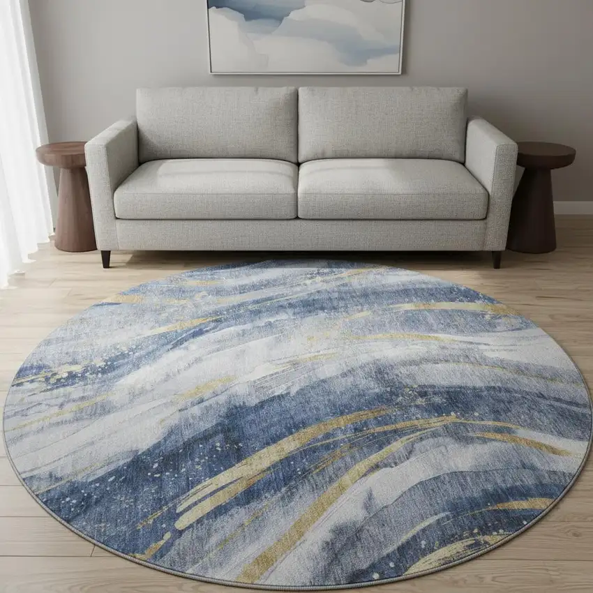 8' Blue Gold And Ivory Abstract Washable Round Rug With UV Protection Photo 2