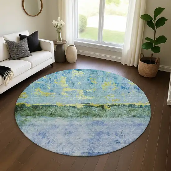 8' Blue Gold And Ivory Abstract Washable Round Rug With UV Protection Photo 4