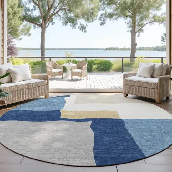 8' Blue Gold And Ivory Round Abstract Washable Indoor Outdoor Area Rug Photo 3