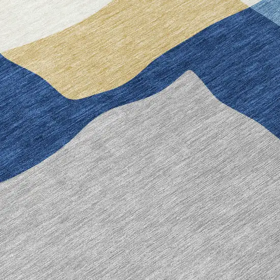 8' Blue Gold And Ivory Round Abstract Washable Indoor Outdoor Area Rug Photo 8