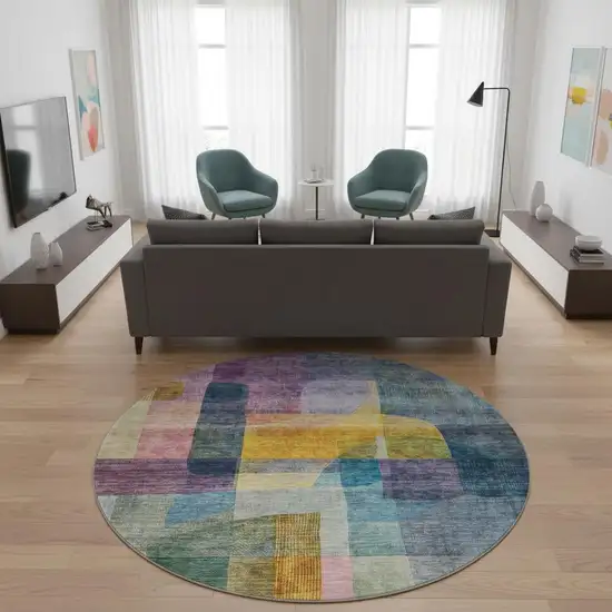 8' Blue Gold And Purple Abstract Washable Round Rug With UV Protection Photo 2
