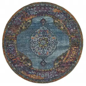Photo of 8' Blue Gold Green Red Orange And Purple Round Oriental Power Loom Stain Resistant Area Rug