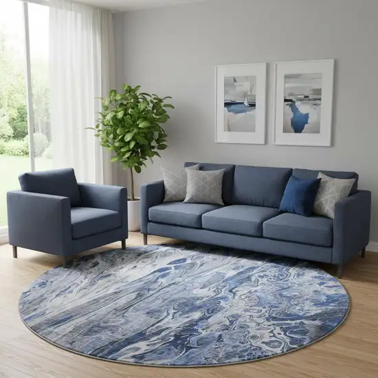 8' Blue Gray And Ivory Abstract Washable Round Rug With UV Protection Photo 1