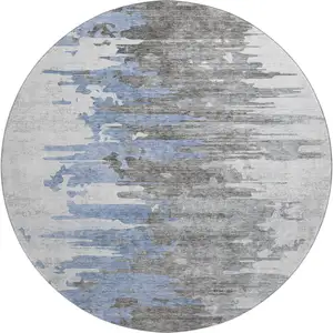 Photo of 8' Blue Gray And Ivory Abstract Washable Round Rug With UV Protection