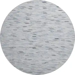 Photo of 8' Blue Gray And Ivory Geometric Washable Round Rug With UV Protection