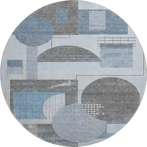 Photo of 8' Blue Gray And Ivory Geometric Washable Round Rug With UV Protection