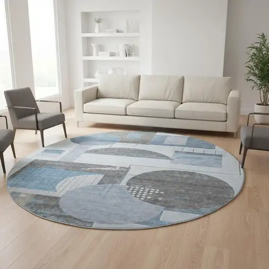 8' Blue Gray And Ivory Geometric Washable Round Rug With UV Protection Photo 2