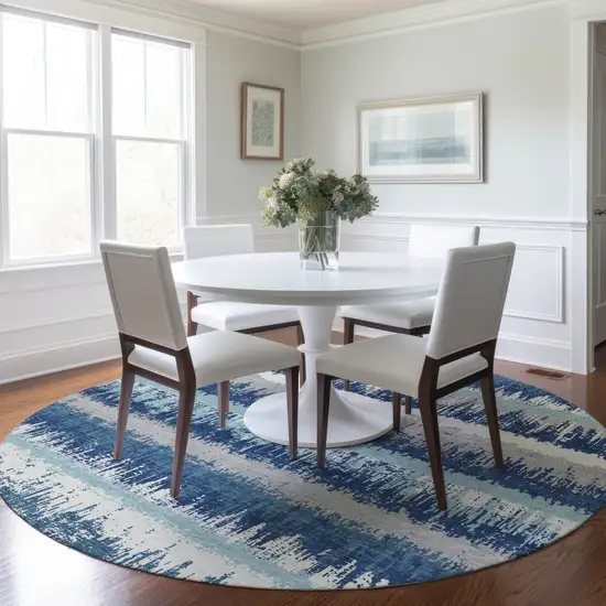 8' Blue Gray And Ivory Round Striped Washable Indoor Outdoor Area Rug Photo 7