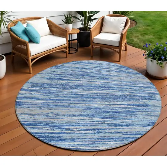 8' Blue Gray And Ivory Round Striped Washable Indoor Outdoor Area Rug Photo 1