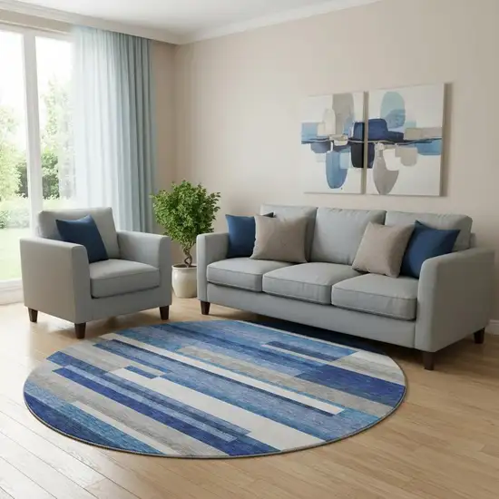 8' Blue Gray And Ivory Striped Washable Round Rug With UV Protection Photo 1