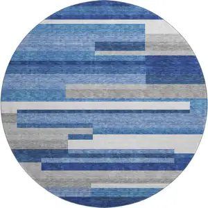 Photo of 8' Blue Gray And Ivory Striped Washable Round Rug With UV Protection