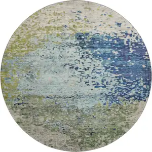 Photo of 8' Blue Green And Beige Abstract Washable Round Rug With UV Protection