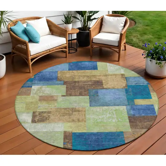 8' Blue Green And Beige Round Geometric Washable Indoor Outdoor Area Rug Photo 2
