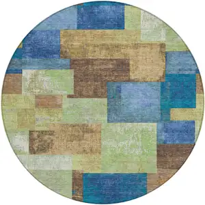Photo of 8' Blue Green And Beige Round Geometric Washable Indoor Outdoor Area Rug