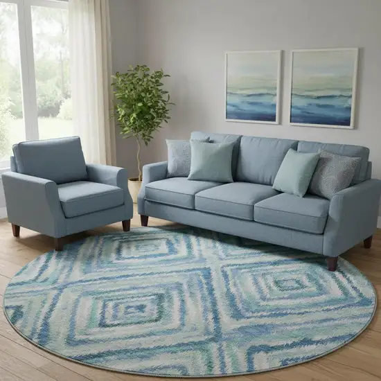 8' Blue Green And Ivory Geometric Washable Round Rug With UV Protection Photo 1