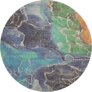 Photo of 8' Blue Green And Orange Abstract Washable Round Rug With UV Protection