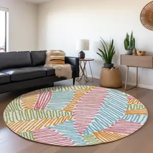 Photo of 8' Blue Green And Pink Round Floral Washable Indoor Outdoor Area Rug
