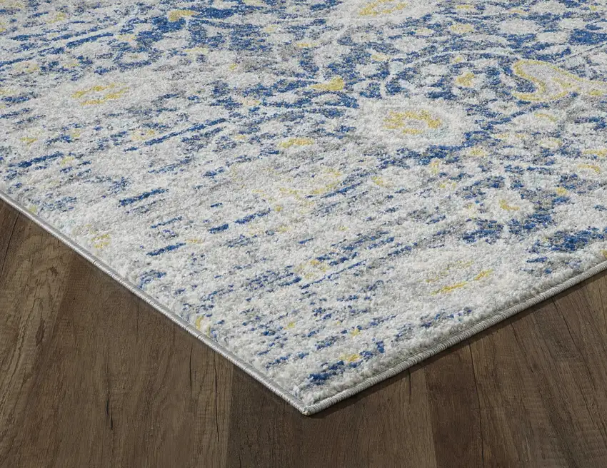 7' Blue Grey Machine Woven Distressed Floral Indoor Runner Rug Photo 1