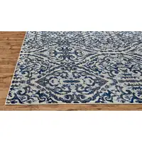 Photo of 8' Blue Ivory And Black Floral Distressed Stain Resistant Runner Rug
