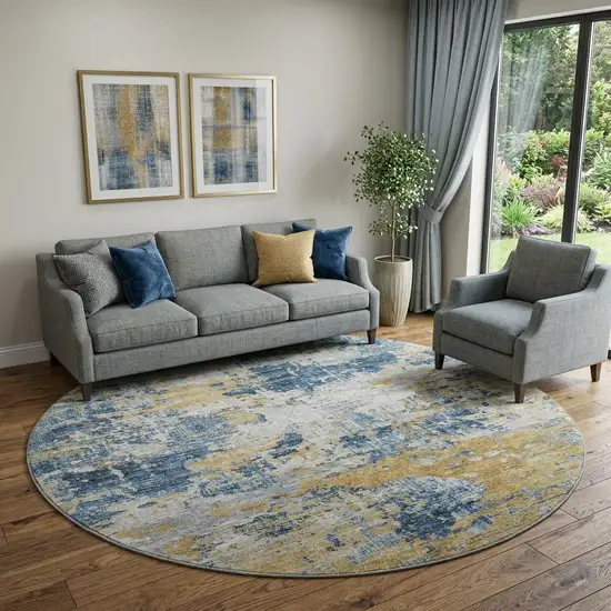 8' Blue Ivory And Gold Abstract Washable Round Rug With UV Protection Photo 1
