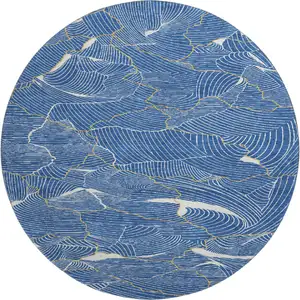 Photo of 8' Blue Ivory And Gold Abstract Washable Round Rug With UV Protection