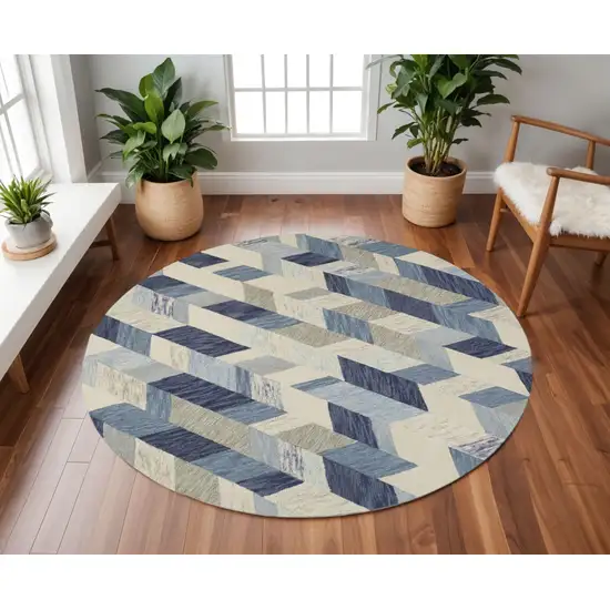 8' Blue Ivory And Gray Round Wool Geometric Tufted Handmade Area Rug Photo 1