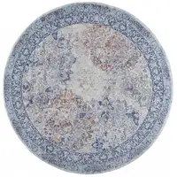 Photo of 8' Blue Ivory And Red Round Floral Power Loom Distressed Stain Resistant Area Rug