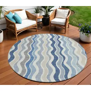 Photo of 8' Blue Khaki And Ivory Round Striped Washable Indoor Outdoor Area Rug