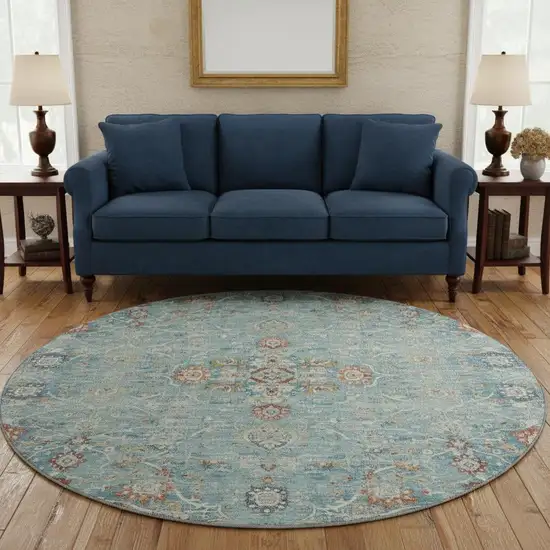 8' Blue Orange And Gold Floral Medallion Washable Round Rug With UV Protection Photo 1