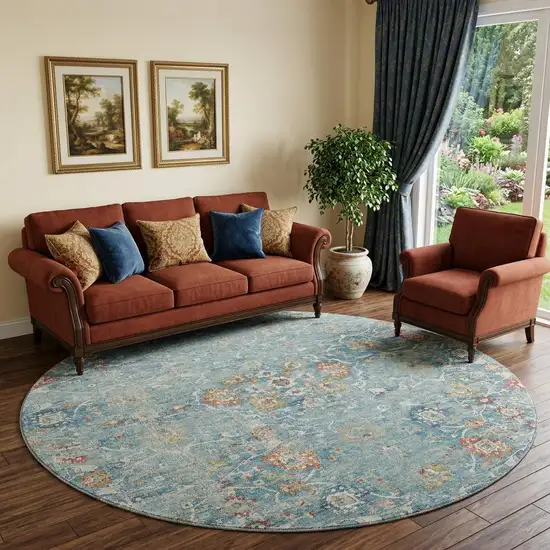 8' Blue Orange And Gold Floral Medallion Distressed Washable Round Rug With UV Protection Photo 1