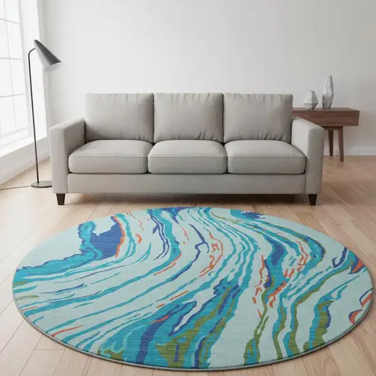8' Blue Orange And Green Abstract Washable Round Rug With UV Protection Photo 2