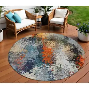 Photo of 8' Blue Orange And Ivory Round Abstract Washable Indoor Outdoor Area Rug