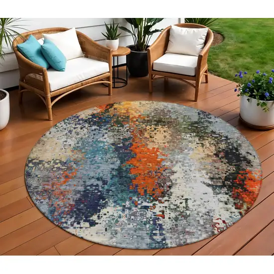8' Blue Orange And Ivory Round Abstract Washable Indoor Outdoor Area Rug Photo 1