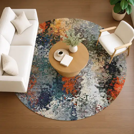 8' Blue Orange And Ivory Round Abstract Washable Indoor Outdoor Area Rug Photo 9